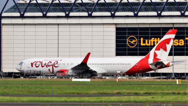 BOEING 767-300 (C-FMLZ) - air canada rouge b767-316er c-fmlz in storage at shannon 1/8/20.