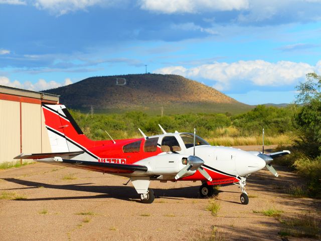 Beechcraft 55 Baron (N177AB) - Checking the Turf height...