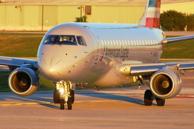 Embraer 170/175 (N418YX) - Taxiing in the last light of the day.