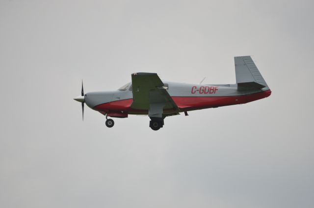 Mooney M-20 Turbo (C-GDBF) - Final approach to runway 36 on Sunday at Airventure 2018