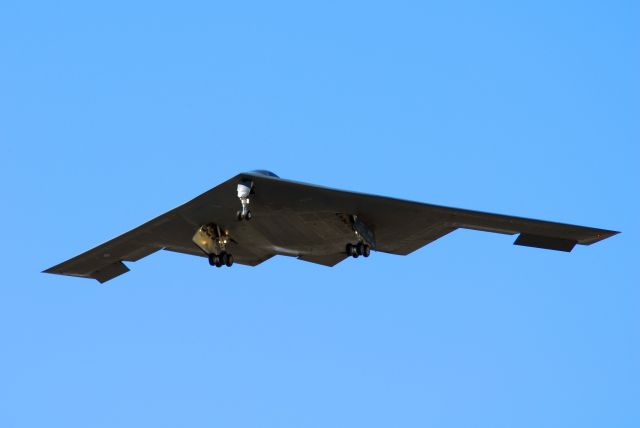 — — - B-2 landing at Whiteman AFB.