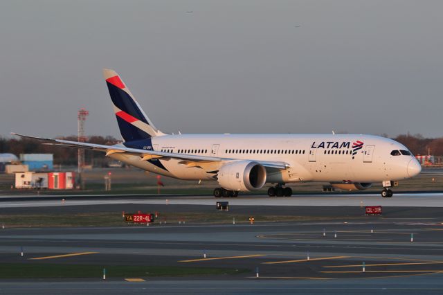 Boeing 787-8 (CC-BBI) - LAN533 departing to SCL in the late afternoon sun, with CC-BBI now in LATAM colours. The dots in the background are EK205 (A6-EOK) and JBU662 (N905JB)