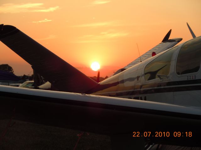 Beechcraft 35 Bonanza (N7835V) - B2OSH Camp Sunset July  23 2012