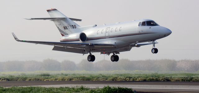 Cessna Citation Sovereign (N877QS) - NetJets Hawker landing at the Merced Regional Airport