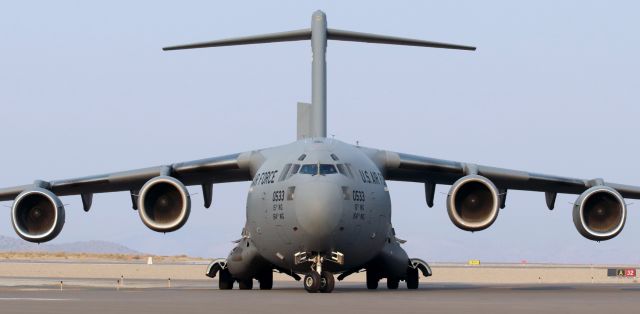 Boeing Globemaster III — - Headon shot as it turns off Alpha to a parking position on the ramp.