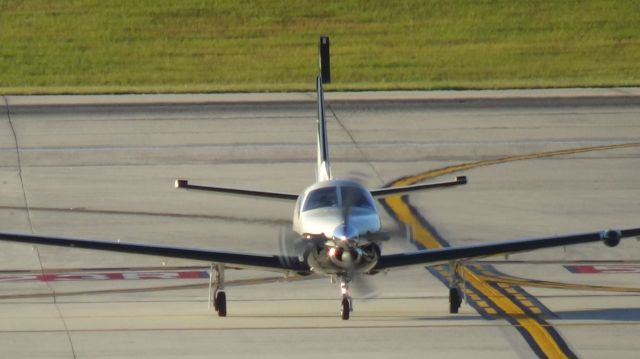 Socata TBM-700 (N227CH) - Turning off runway 23R.