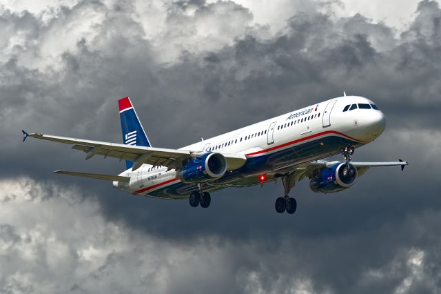 Airbus A321 (N578UW) - Old and New. On short final to 19R just after getting pressure washed about 10-miles back...