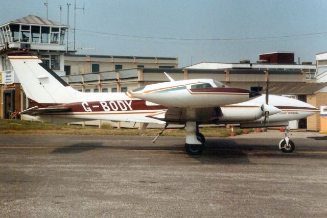 Cessna 310 (G-BODY) - Seen here in Apr-89.