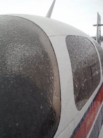 Mooney M-20 Turbo (N252SD) - More pics of the freezing rain in Williston, North Dakota. Not a good day to fly.