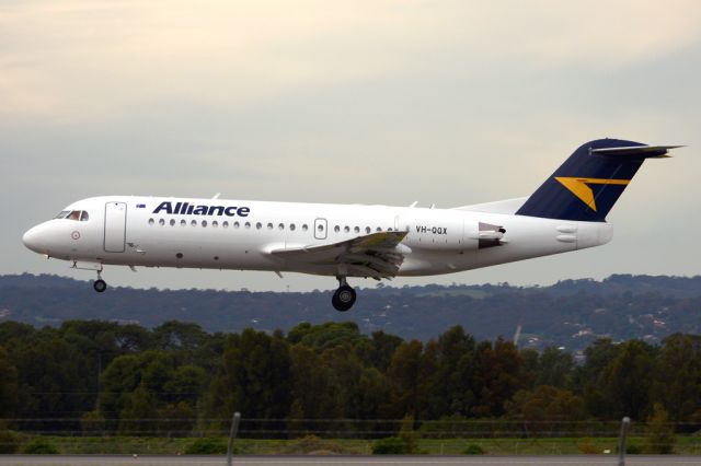 Fokker 70 (VH-QQX) - On short finals for runway 05. Thursday, 19 June 2014.