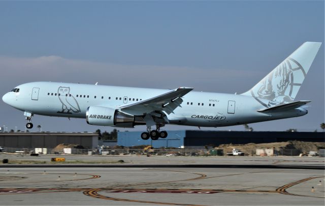 BOEING 767-200 (N767CJ) - Elan Express 1086 (Air Drake) B767-200 landing at Long Beach Airport after a short flight from Lax.