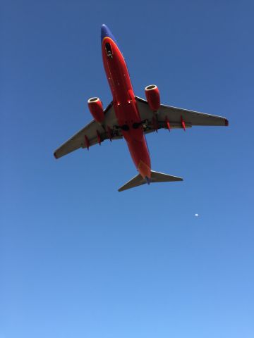 — — - Standing at the corner of Laurel and Kettner, a great place to be right under the planes as they land in San Diego. Taken with an iPhone