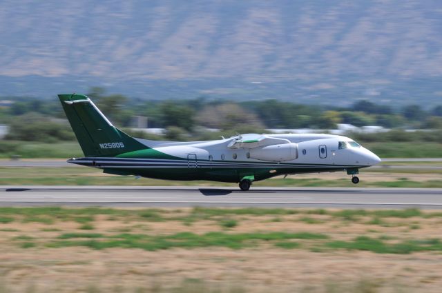 Fairchild Dornier 328JET (N259DS) - Quite a unique aircraft touching down here in Provo. Love the green paint! br /Best viewed in full! 