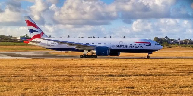 Boeing 777-200 (G-VIIY) - Taking off from TBPB