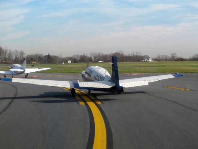 Mooney M-20 (N2229F) - Holding short runway 34.