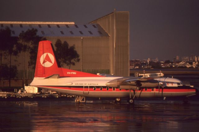 FAIRCHILD HILLER FH-227 (VH-FNU) - Ansett Airlines F27-600 VH-FNU at Sydney Airport after a severe thunderstorm in 1983.