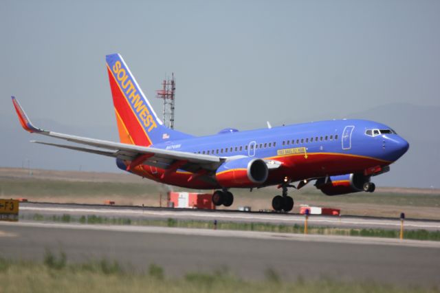 Boeing 737-700 (N474WN) - Landing on 34R.