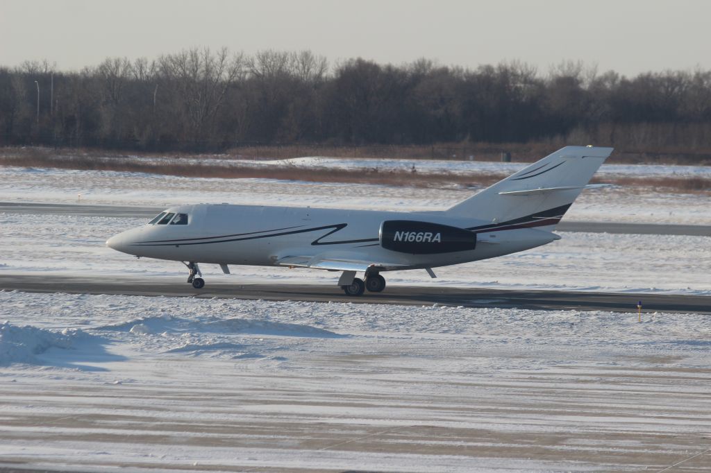 Canadair Challenger (N166RA) - Watching this aircraft taxi out on "Charlie" taxiway after dropping off cargo at Gary Regional Airport.