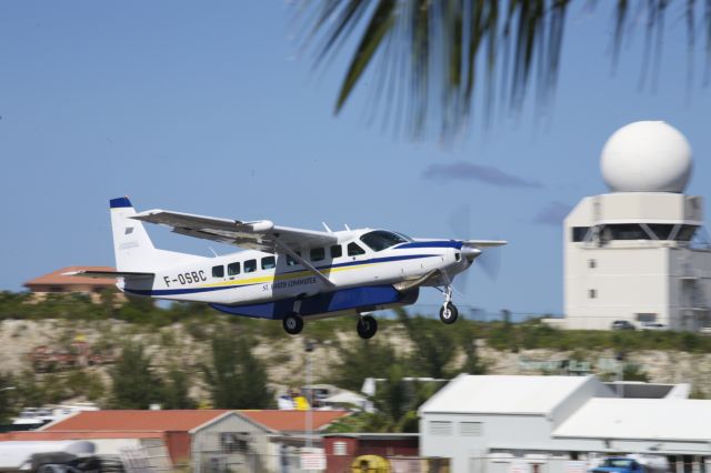 Cessna Caravan (F-OSBC) - Stylish Grand Caravan operated by St Barth Commuter Airlines lifting off from Sint Maarten..