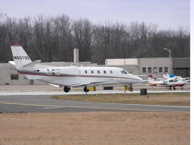 Cessna Citation Excel/XLS (N607QS) - This Twin Engine Business Jet is shown here in the Spring of 2013 a second or two from departure.