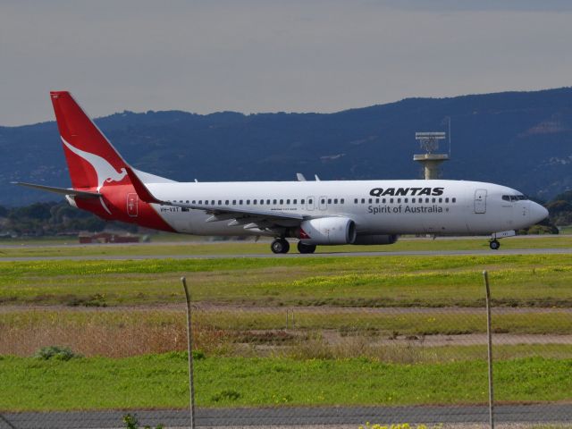 Boeing 737-800 (VH-VXT) - On taxi-way heading for take off on runway 05. Thursday 12th July 2012.