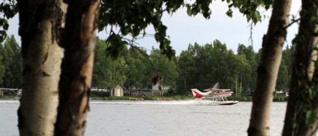 N10485 — - Float plane taking off from Lake Hood in Anchorage, AK.