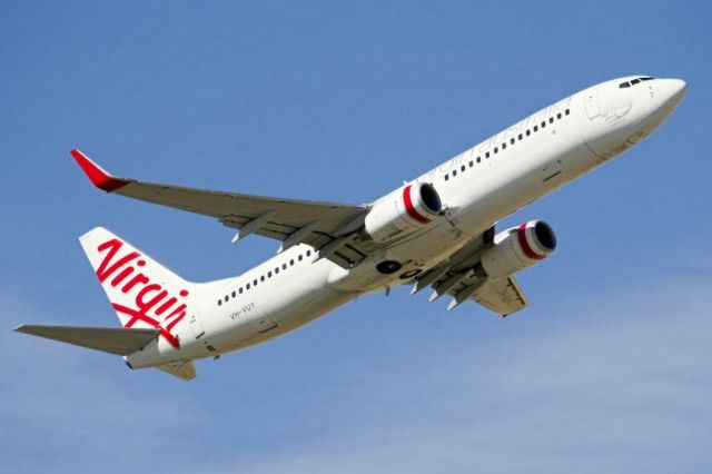 Boeing 737-800 (VH-VUY) - Heading skywards off runway 23. Thursday, 4th April 2013.