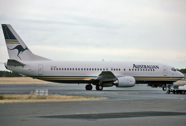 Vans RV-6 (VH-TJM) - AUSTRALIAN AIRLINES - BOEING 737-400 - REG VH-TJM (CN 24438) - ADELAIDE INTERNATIONAL AIRPORT SA. AUSTRALIA - YPAD (26/12/1991)35 MM SLIDE SCANNED AT 6400 DPI.