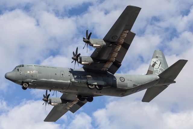 — — - RAAF, C130J on short finals to RAAF, Townsville.