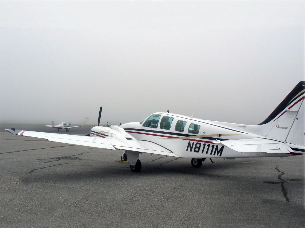 Beechcraft Baron (58) (N8111M) - At Rockland, ME.