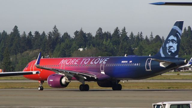 Embraer 170/175 (N926VA) - Picture taken from inside the terminalbr /Alaska just taxiing by 