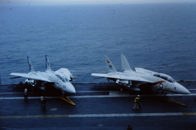 Grumman F-14 Tomcat (202 & 111) - In February 1982, two F-14's from USS Enterprise CVN-65 had to take a "short field" arrested landing on board USS Midway, CV-41. The next day, Enterprise was clear of the fog and the two aircraft were able to return. As far as I know, the only time F-14's landed and launched from USS Midway.