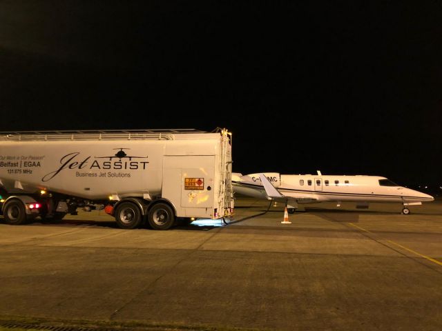 Learjet 40 (C-FEMC) - Parking on the GAT at Belfast International EGAA/BFS on a quick turn 