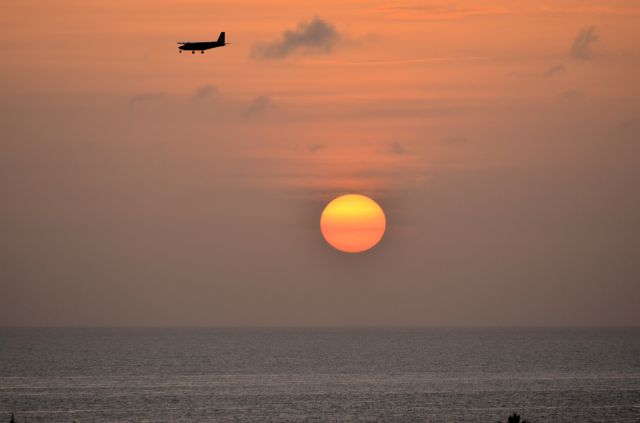 — — - Landing during a beautiful sunset