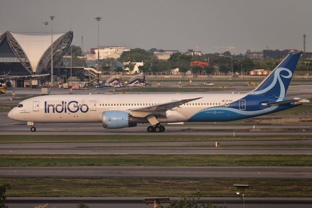Boeing 787-9 Dreamliner (LN-FNC) - 4th May, 2025: IndiGo flight 6E 1054 taxiing for departure to Indira Gandhi International Airport in Delhi from Bangkok's Suvarnabhumi. Aircraft is operated by Norse Atlantic Airways. View from runway facing 3rd floor balcony of Siam Mandarina Hotel on King Kaeo Rd. 
