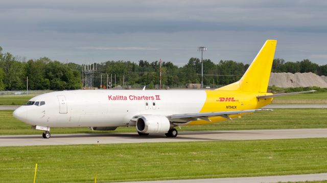 BOEING 737-400 (N734CK) - (6/18/2019) One of KI's 734F's taxies to runway 4 for it's daily flight to BDL.