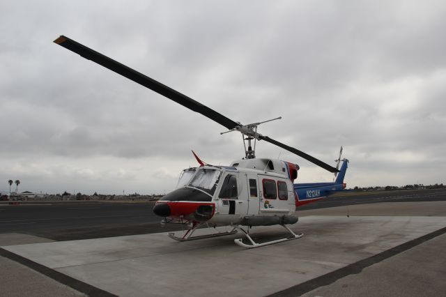 Bell VH-1 (N212AH) - On that pad at Aspen Helicopters.