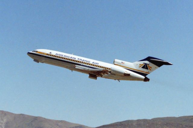 Boeing 727-100 (N287AT) - KRNO - N287AT departing Reno NV USA north there was always something cool at Reno jet wise  in the roughly June 1989?? photo.