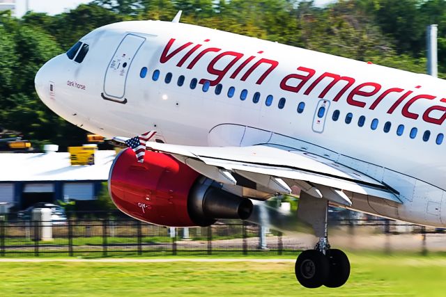 Airbus A319 (N524VA) - Top deck B parking garage