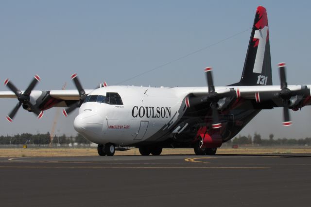 Lockheed C-130 Hercules (N131CG) - Coulson Tanker 131 taxiing to the base after a fire dispatch. 