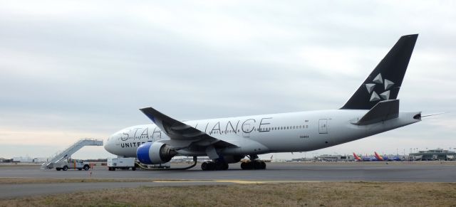 Boeing 777-200 (N218UA) - Catching some tarmac time is this 2001 United Airlines Star Alliance Boeing 777-222ER in the Winter of 2023.