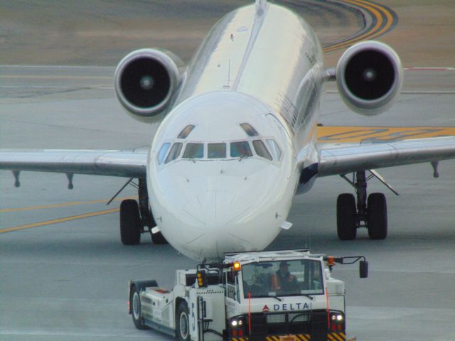 McDonnell Douglas MD-90 (N944DN) - being towed to bed at KATL on 3/28/2015