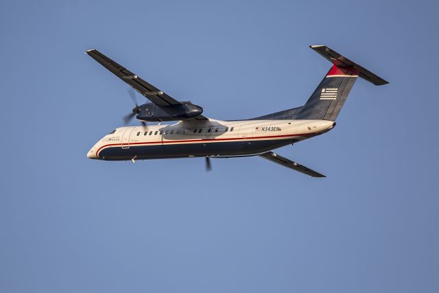 de Havilland Dash 8-200 (N343EN) - DeHavilland Dash 8 Taking off into the sunset from runway 36R, Charlotte, North Carolina USA