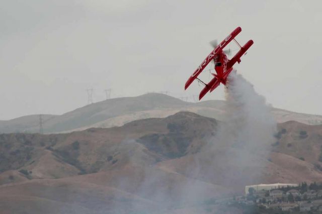 — — - Sean D. Tucker performing at the 2013 Planes of Fame airshow in Chino, CA.