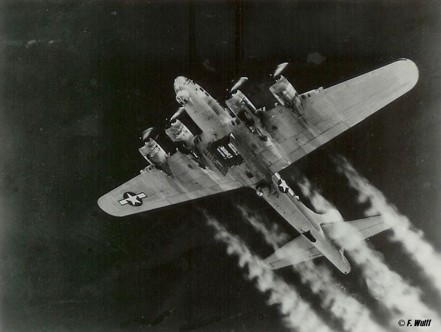 — — - Taken by my Great Uncle during World War Two. This was taken from a gunners position on top of the aircraft. This photo was taken after a flack attack from German ground troops. I have come to find out that there are not many photos left of this squadron and that not many were taken. Sadly my Great Uncle has passed away and his wife and his brother gave me permission to share this photo.. Copy Right FWulff