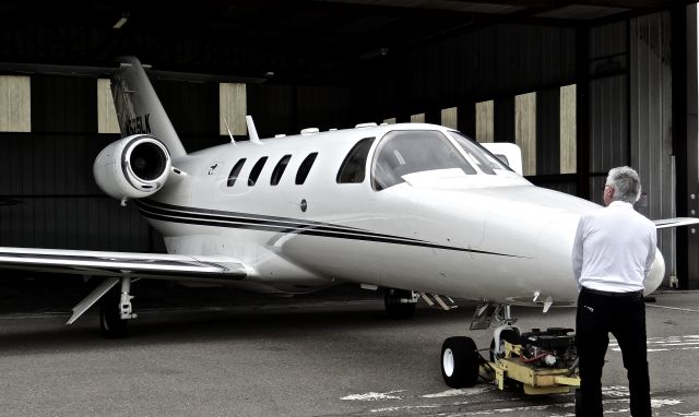 Cessna Citation CJ1 (N525LK) - Pushing back a locally-based Cessna CitationJet 1 back into its hangar @ Reid Hillview.