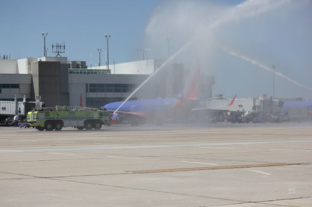 Boeing 737-800 (N8301J) - The first Southwest 737-800 to DIA gets a water cannon salute from Denver Fire.