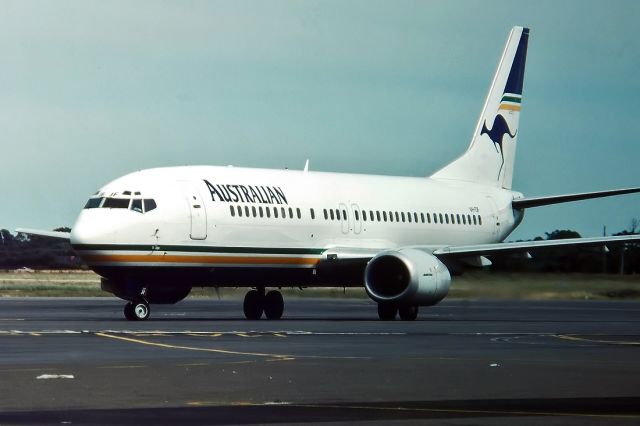 BELL-AGUSTA AB-139 (VH-TJF) - AUSTRALIAN AIRLINES - BEOING 737-476 - REG : VH-TJF (CN 24431/1863) - WEST BEACH ADELAIDE SA. AUSTRALIA - YPAD (16/1/1993)