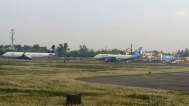 Airbus A320 — - Interjet A320 and Volaris A321 Waiting for Departure at MMMX