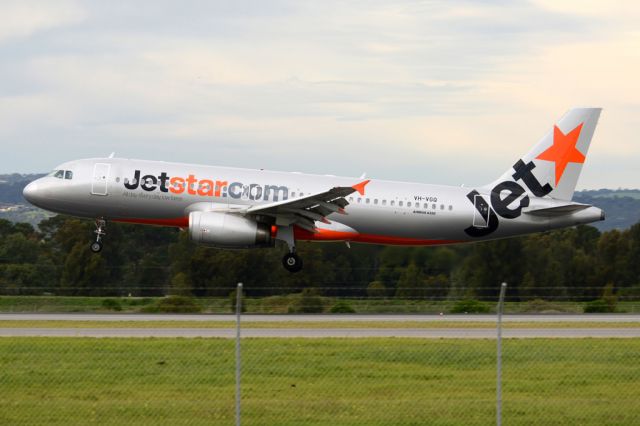 Airbus A320 (VH-VGQ) - About to put down on runway 05. Thursday, 19 June 2014.